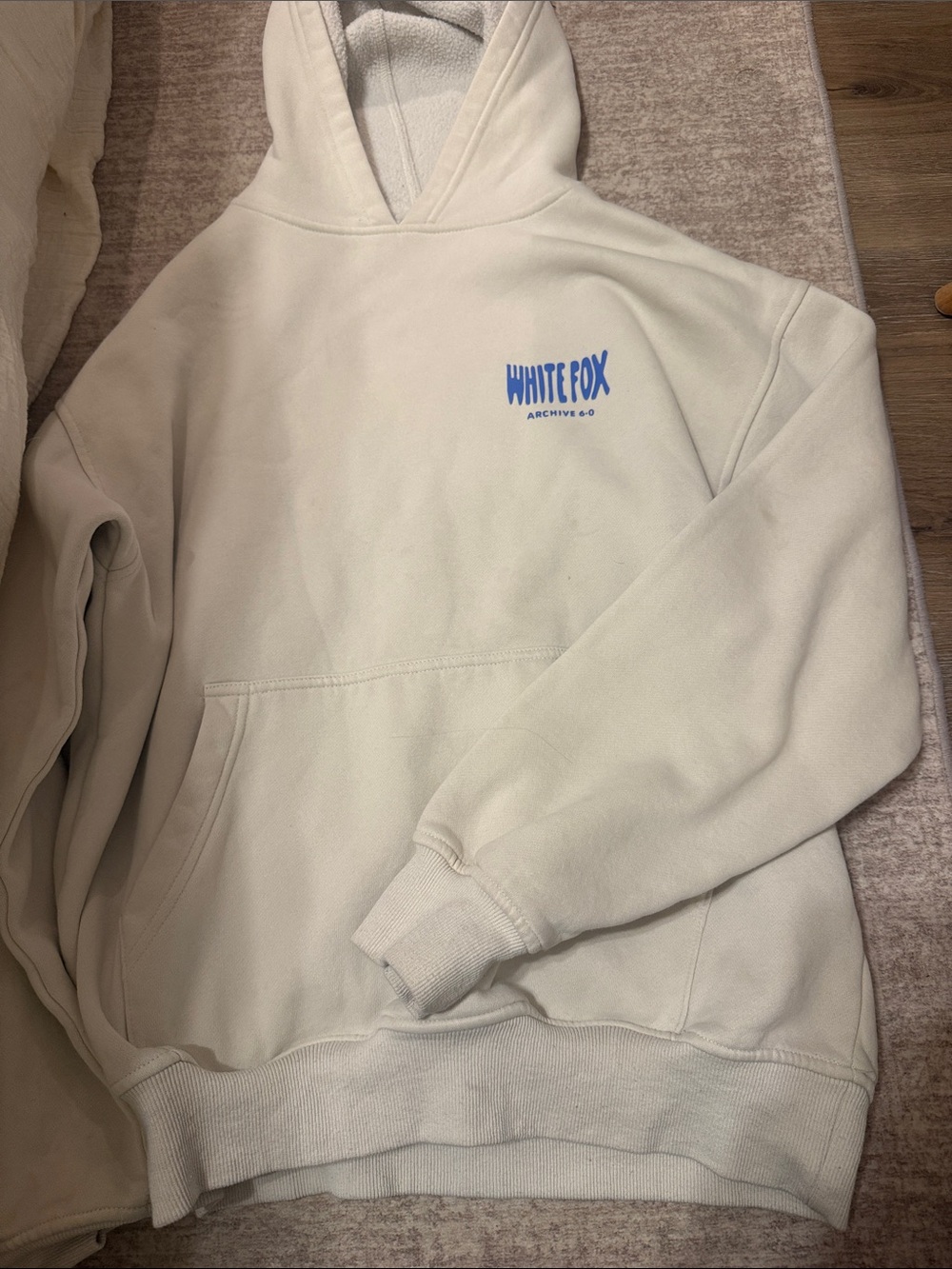 White Fox Boutique Cream Crewneck Hoodie with Blue Logo